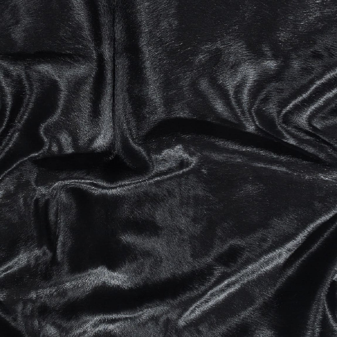 dyed black Brazilian cowhide detail - The Coastal Compass Home Decor