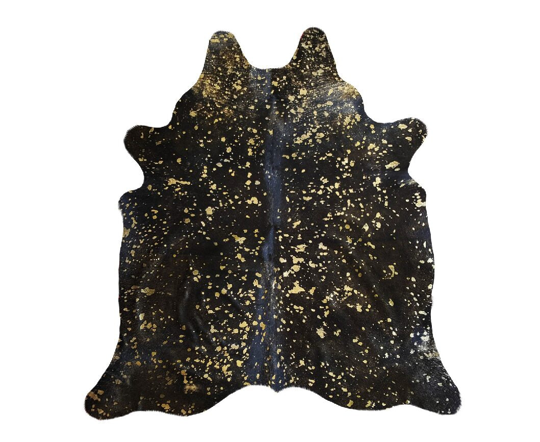 Metallic gold on black cowhide - The Coastal Compass Home Decor