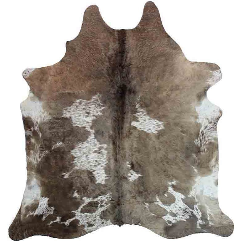 Taupe and white cowhide rug - The Coastal Compass Home Decor