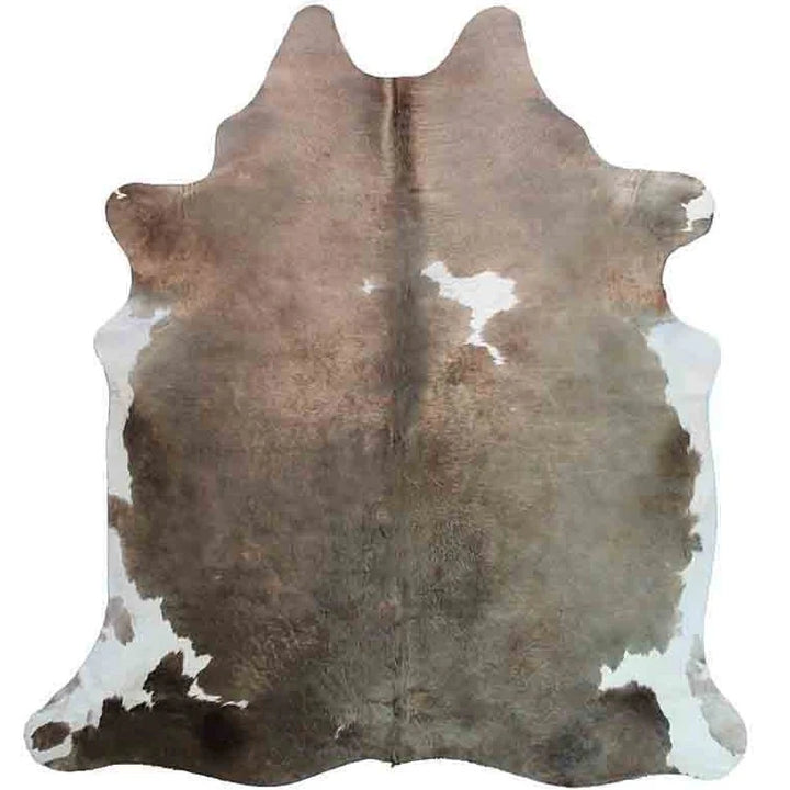 Taupe and white cowhide rug - The Coastal Compass Home Decor