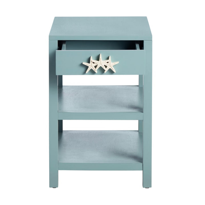 Light blue side table with starfish design on a white background