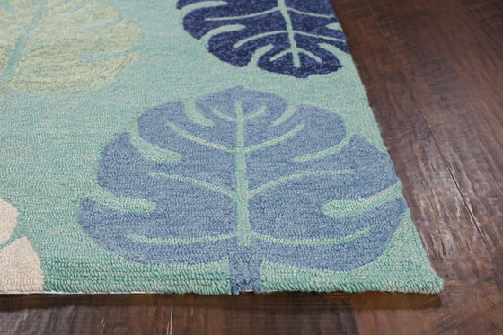 Turquoise Monstera Area Rug | Coastal Compass  Edit alt text