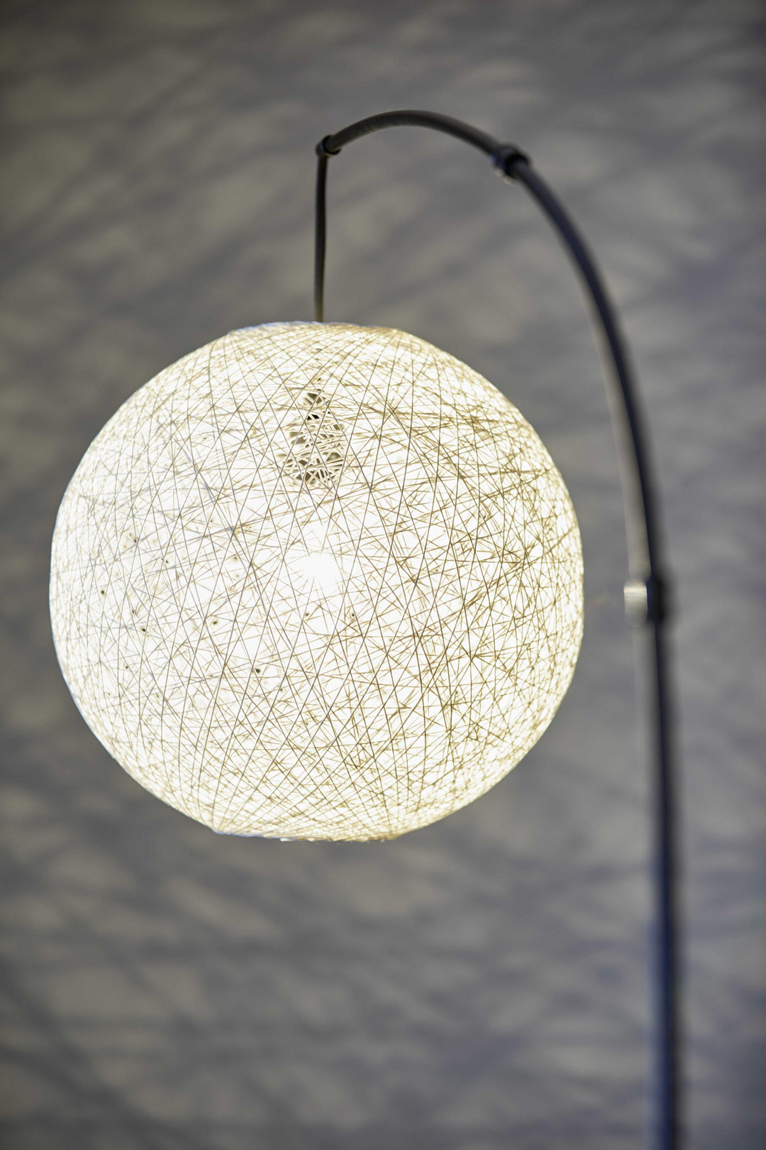 Floor Lamp with Bronze Metal Arc and Groovy Rattan String Ball Shade