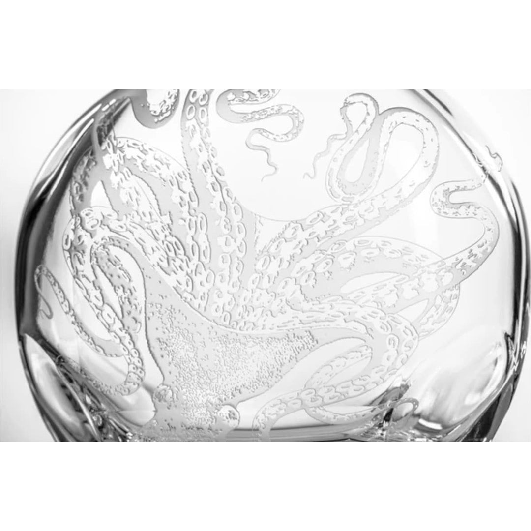 Engaved detail on coastal glass decanter with engraved octopus. Made in the USA. Coastal Compass Home Decor