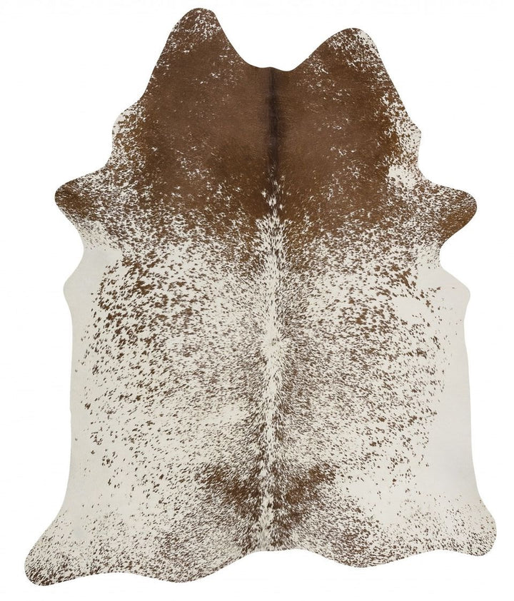 Brazilian Brown and White Peppered Cowhide • Coastal Compass Home Decor