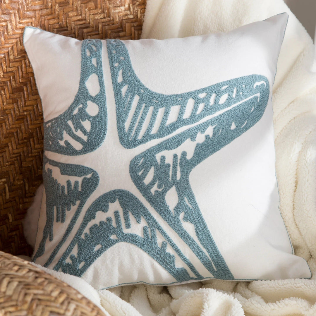 Blue grey chain stitched star fish on white cotton. Coastal Compass Home Decor