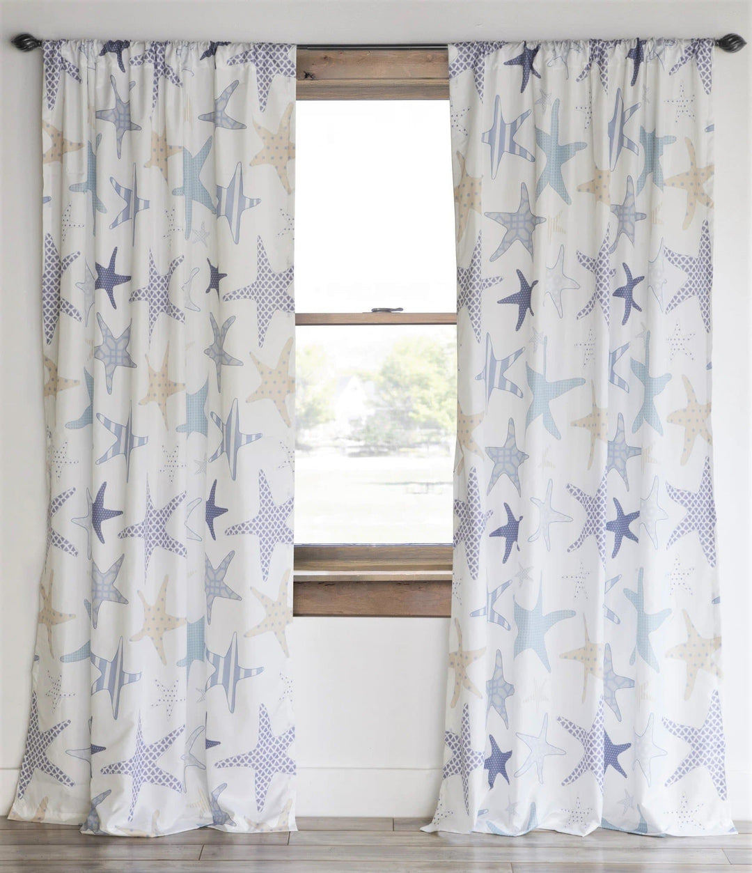 Printed star fish over white cotton fabric curtain set. The Coastal Compass Home Decor