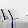 White sheets with navy blue flange - The Coastal Compass Home Decor